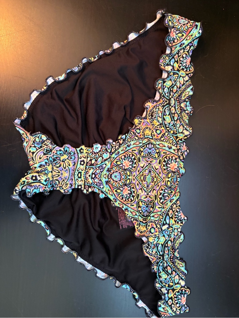 Victoria's Secret Black with Multicolor Paisley Ruffle and Rouched Swim bottoms.